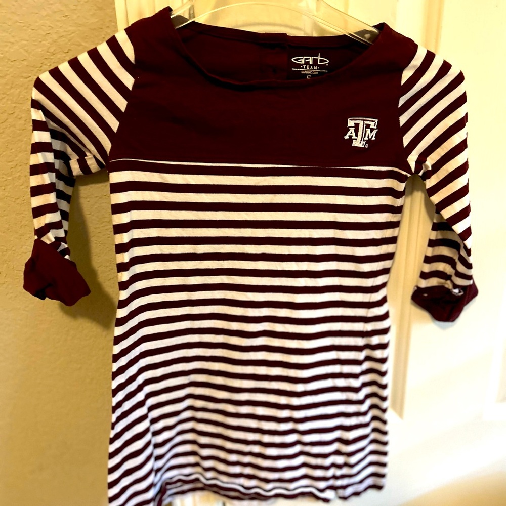 Texas A&M licensed outfitters, game day dress. Purchased from MSC on campus.
